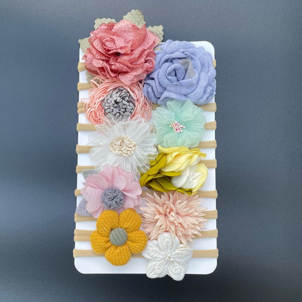 Brand new! 10 Piece baby girl flower elastic headband